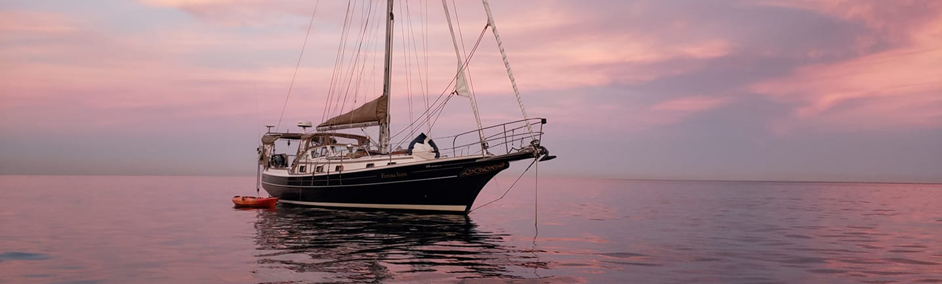 Festina Lente anchored during a beautiful sunset.