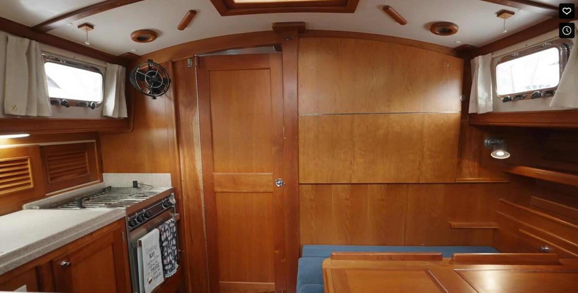 A view of Festina Lente's forward bulkhead having been closed up to provide privacy for the foward cabin.